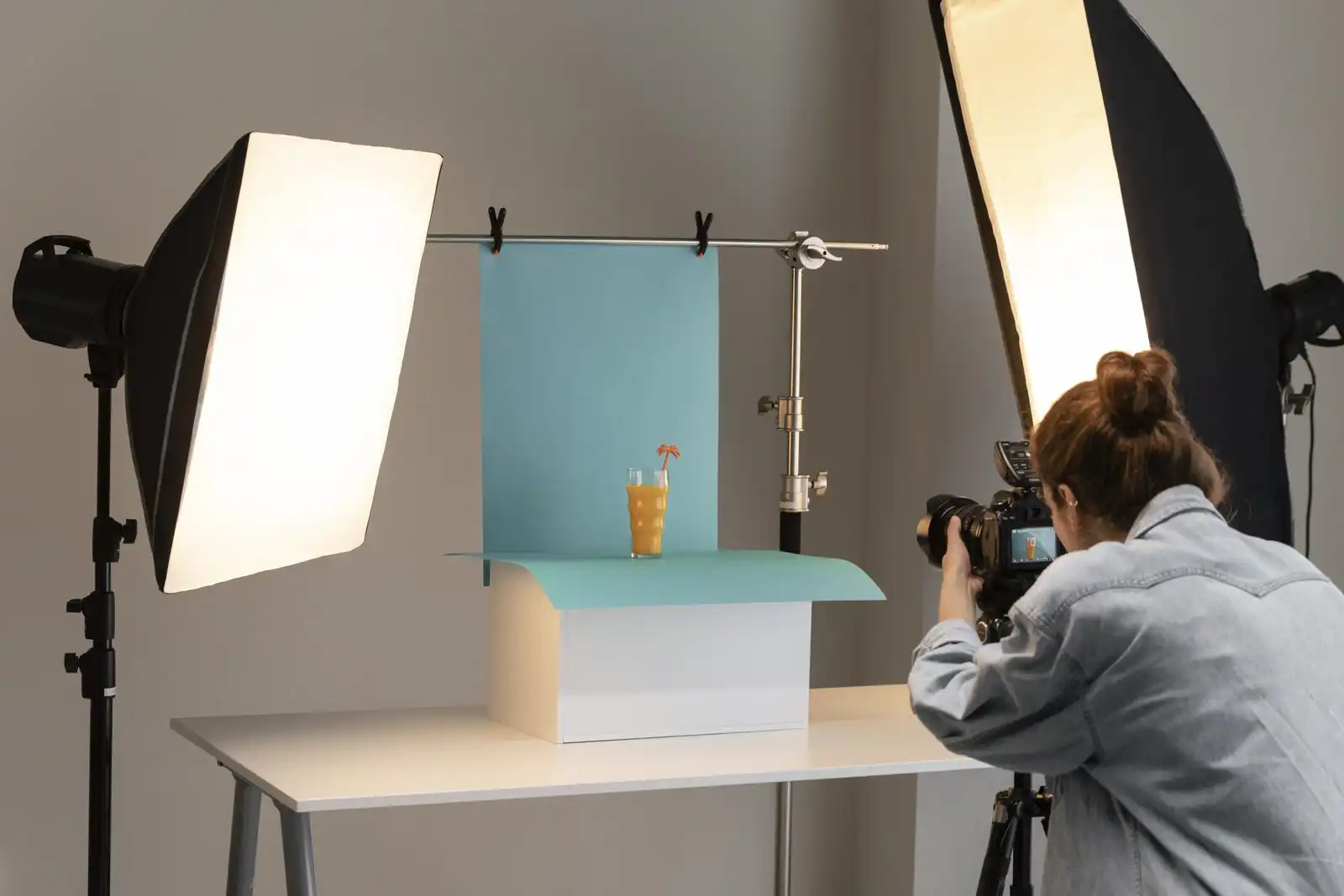 young female product photographer studio scaled